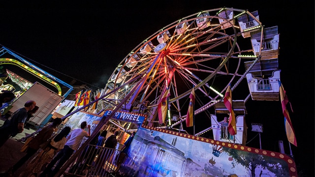 ferris wheel at night at spring carnival
