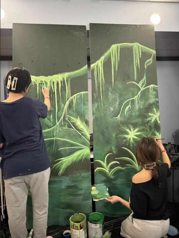 art students painting a scene