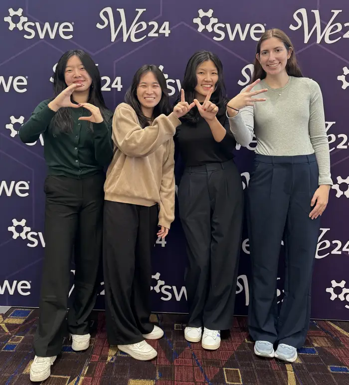 Katherine and her friends pose for a picture at SWE event