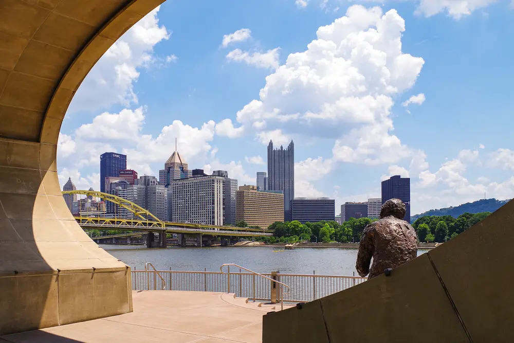 Mr. Rogers statue and a view of downtown Pittsburgh.