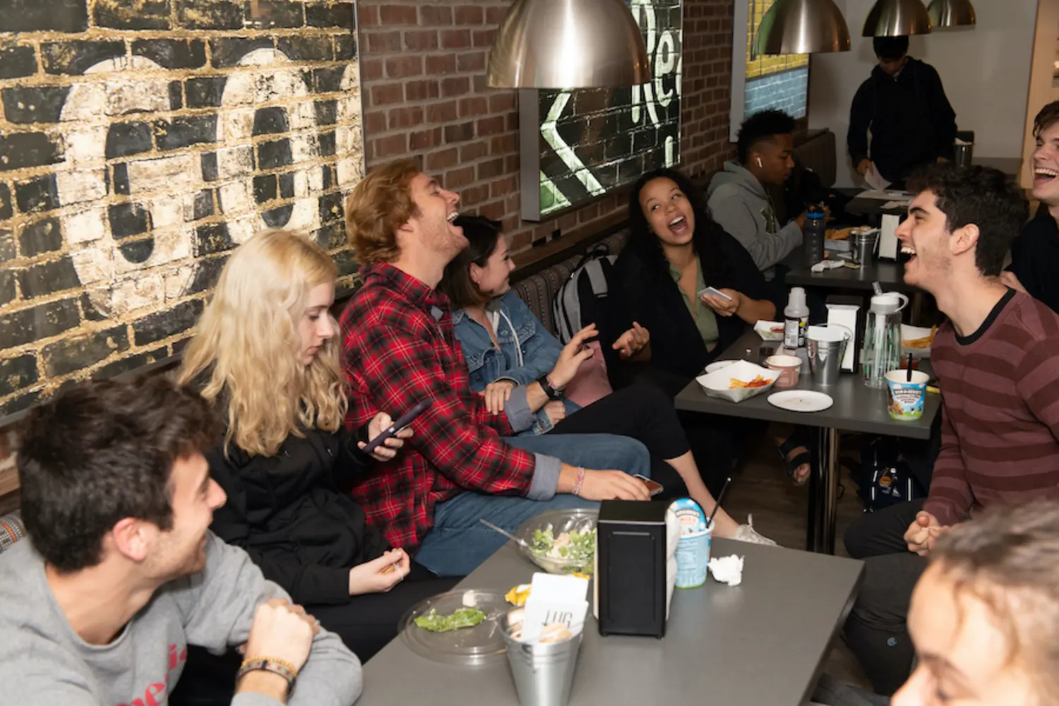 Students enjoy a meal at The Underground, one of CMU's on-campus dining locations.