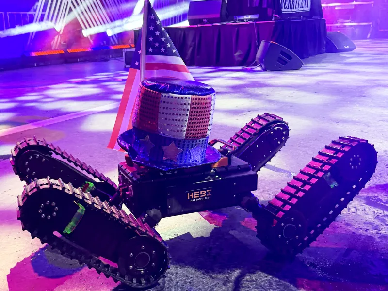 Robot with American Flag sticking out of the top